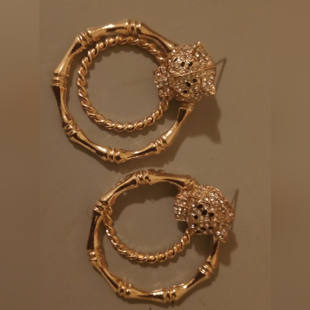 Gold Jaguar earrings